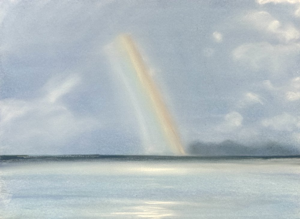 袋湾の朝の、のさり虹